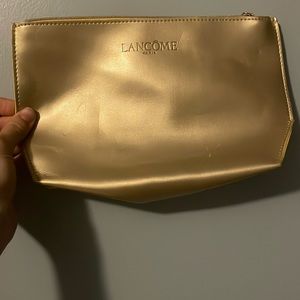 A makeup bag or a pencil case